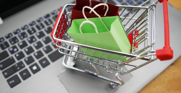 shopping-cart-4516039_960 mini shopping cart with bags sitting on a computer keyboard