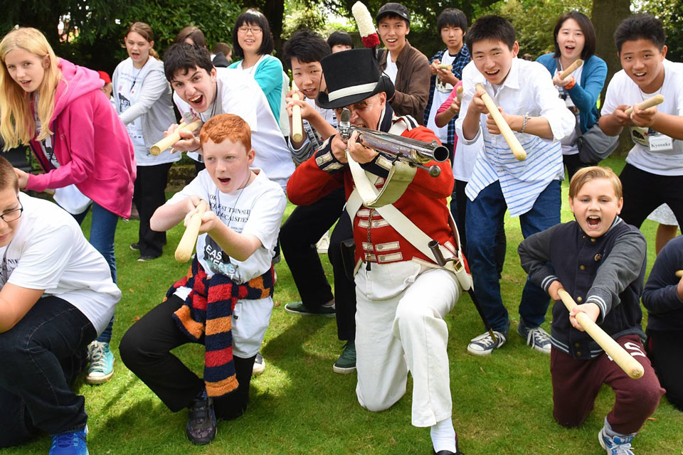Nigel Amies and young people in historical military re-enactment. Photo Credit: Norfolk Museums Service