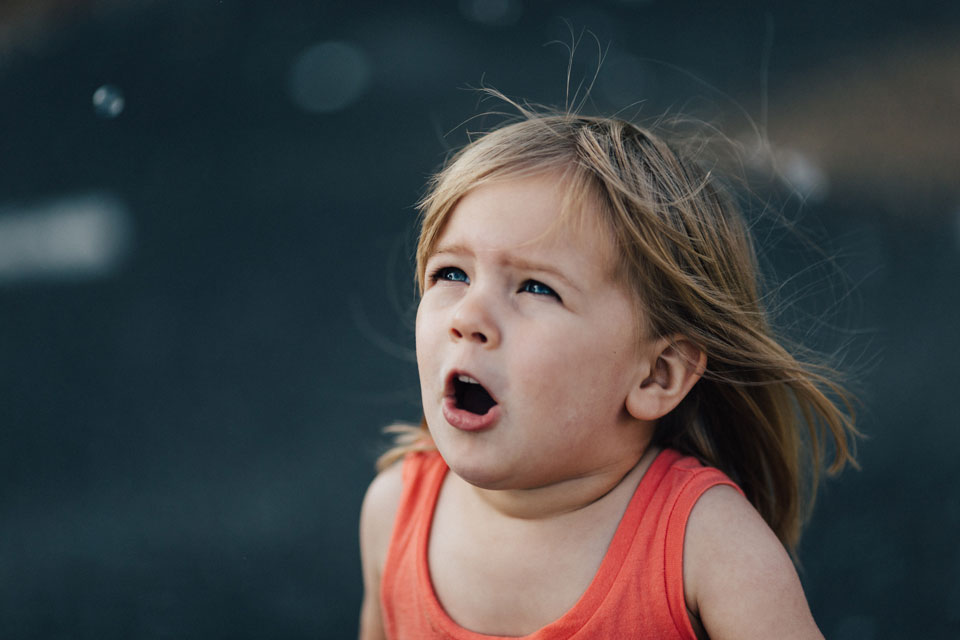 Young girl reacting intensely