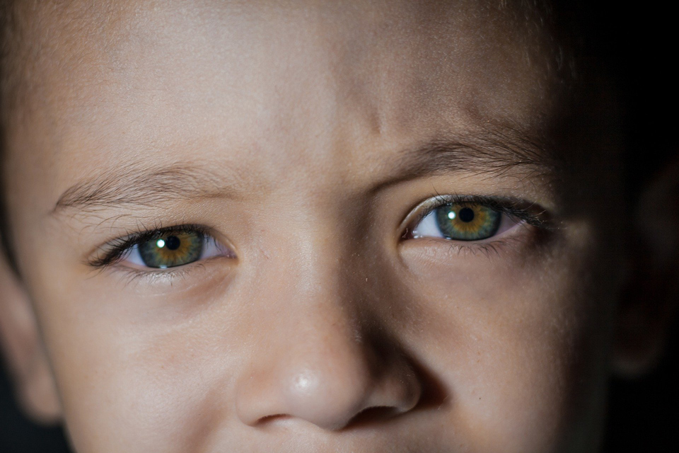 Detail of child's face with a confused look
